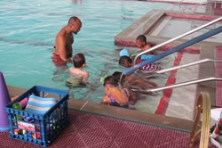 students learning how to swim