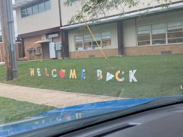 Welcome Back in front of school