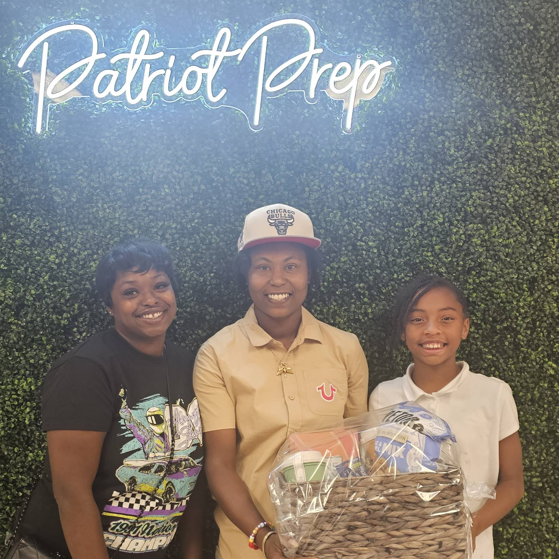 3 people with gift basket